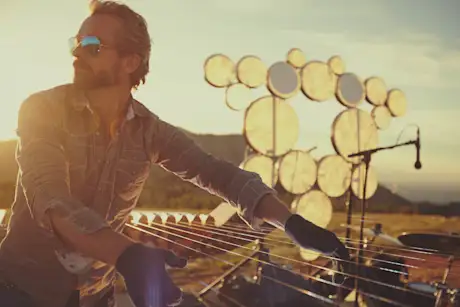 Installing the earth harp for a musical performance on Powder Mountain 